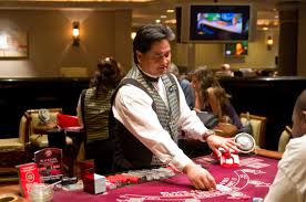 man-dealing-out-cards-for-casino